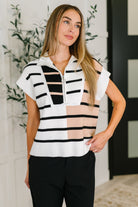 Striped knit vest, quarter zip sweater vest, ribbed knit top, women's sleeveless sweater, nautical stripe vest, fall layering piece, white and black vest, travel fashion, mid-weight knitwear.