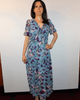 Boho floral dress, V-neck maxi dress, summer floral gown, ruffle maxi dress, wrinkle-resistant dress, breathable floral dress, bohemian chic style, high waist maxi, sky blue floral dress, fiery red maxi.