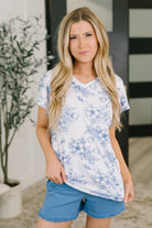 floral v-neck top, jersey knit floral shirt, dolman sleeve floral top, soft floral blouse, women's stretch floral top, banded hem top, spring floral fashion, breathable jersey top