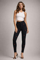 black skinny jeans, high waisted jeans, heart stud jeans, women's statement denim, USA made jeans, cropped black jeans, heart print denim, premium stretch denim, Cupid jeans, night out outfit