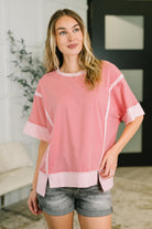 pink french terry top, exposed seam shirt, women’s casual pink top, drop shoulder lounge top, high low hem top, comfortable pink sweatshirt, boutique casual wear