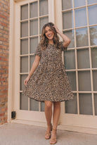 leopard print dress, babydoll mini dress, tiered summer dress, animal print fashion, flutter sleeve dress, women’s boutique dresses, casual mini dress