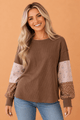 Waffle knit top, floral patchwork shirt, boho long sleeve, colorblock pullover, women’s transitional fashion, floral sleeve top, casual chic apparel, brown waffle knit.