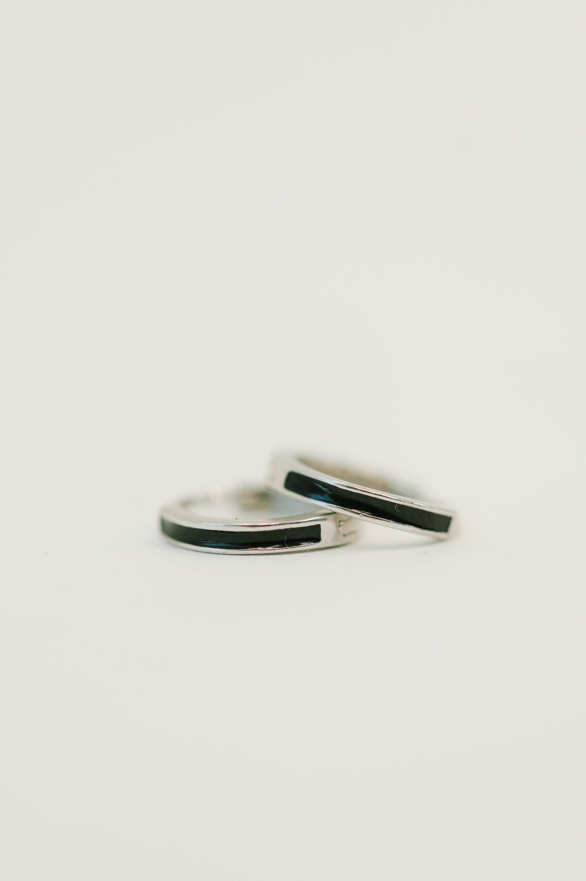 Sterling silver huggies, black enamel earrings, 925 silver hoops, hypoallergenic jewelry, minimalist huggie hoops, everyday silver earrings, nickel-free jewelry.