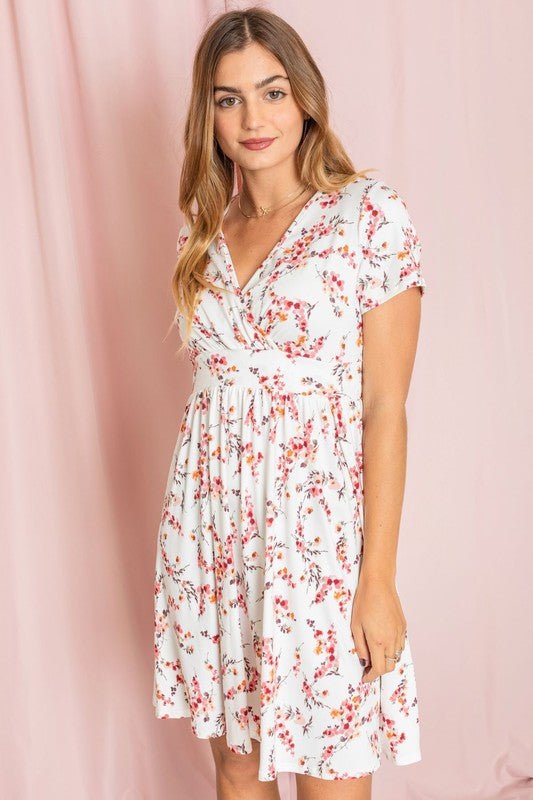Plus size floral dress, surplice midi dress, ditsy floral print, women's plus size fashion, made in USA dress, wrap style midi, spring floral dress, empire waist plus size, flattering plus size clothing.