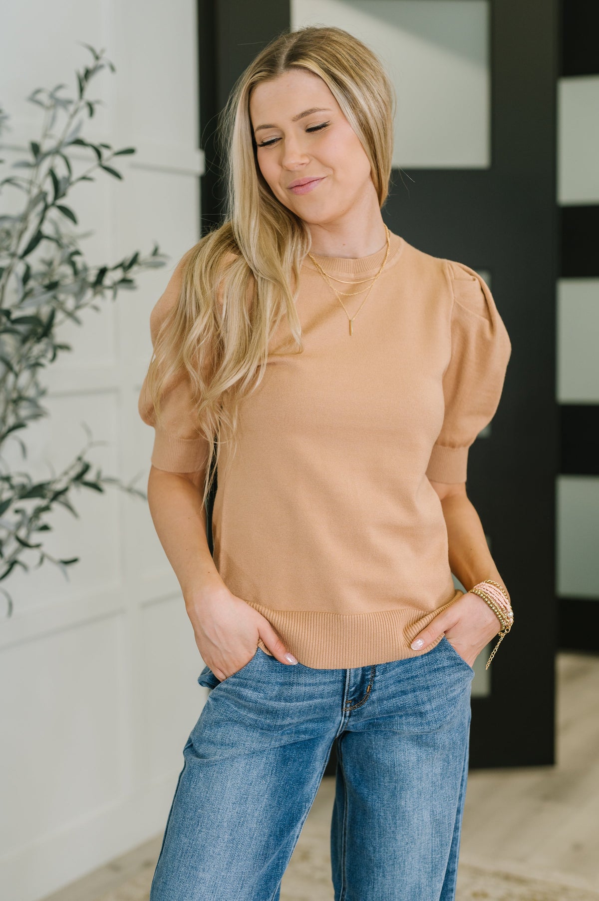 Puff sleeve blouse, ribbed knit top, brush color blouse, women’s designer knitwear, stretch knit top, elegant casual blouse, tan puff sleeve top, boutique apparel, work-to-weekend top.