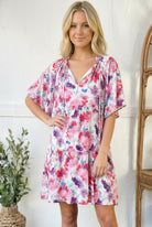 watercolor floral dress, tiered mini dress, spring brunch outfit, V-neck floral dress, women's flowy dress, pastel floral dress, boho tiered dress, summer garden party dress, lightweight floral dress, pink watercolor dress
