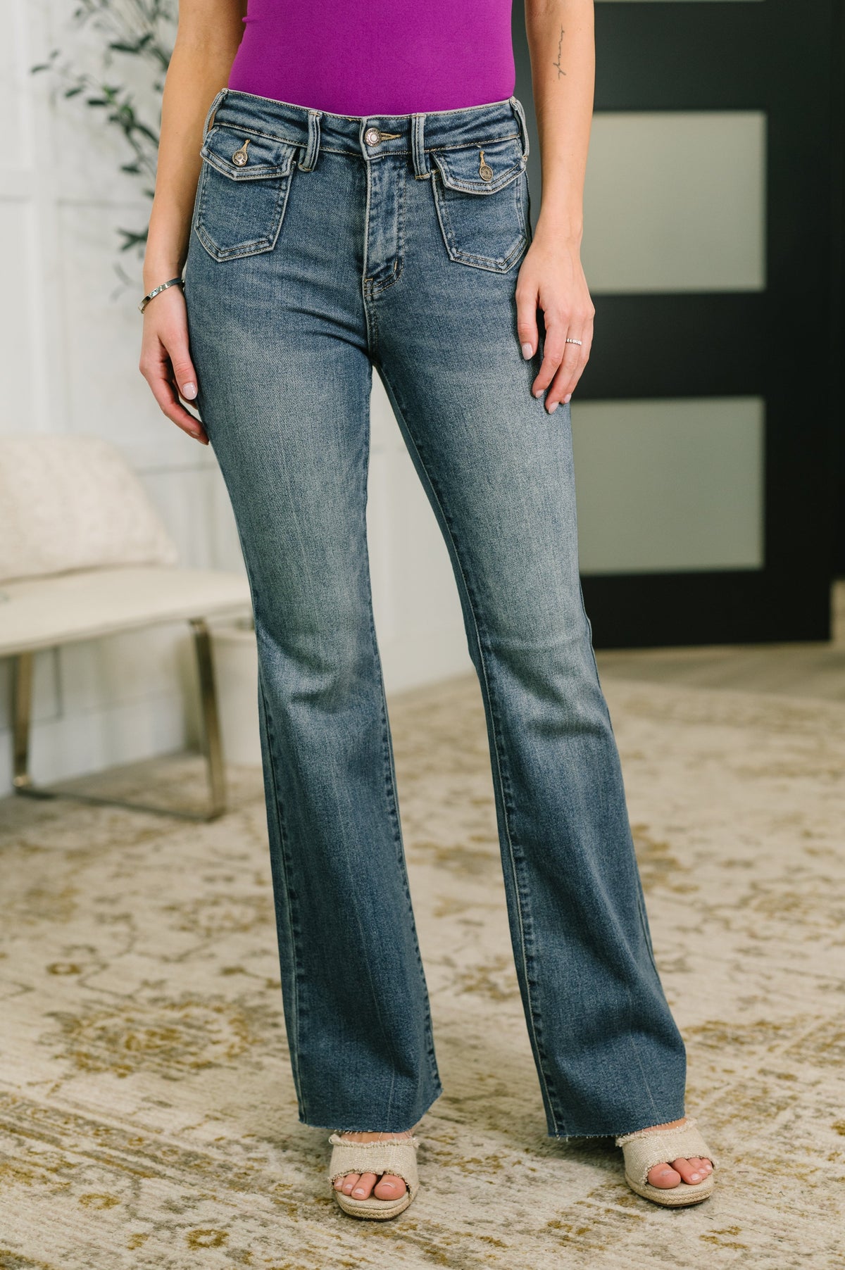 Judy Blue jeans, mid-rise flare jeans, front flap pocket denim, raw hem flares, women's stretchy flare jeans, Jackie flare jeans, premium denim trousers.