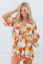 Orange floral romper, tie front romper, tropical vacation outfit, cutout summer romper, boho floral jumpsuit, women's resort wear, floral romper with pockets, summer romper for women.