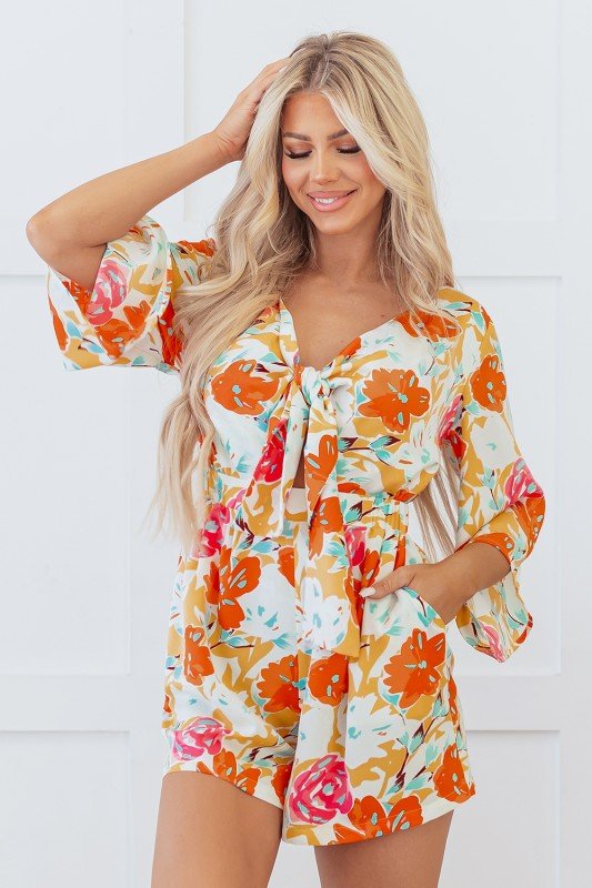 Orange floral romper, tie front romper, tropical vacation outfit, cutout summer romper, boho floral jumpsuit, women's resort wear, floral romper with pockets, summer romper for women.