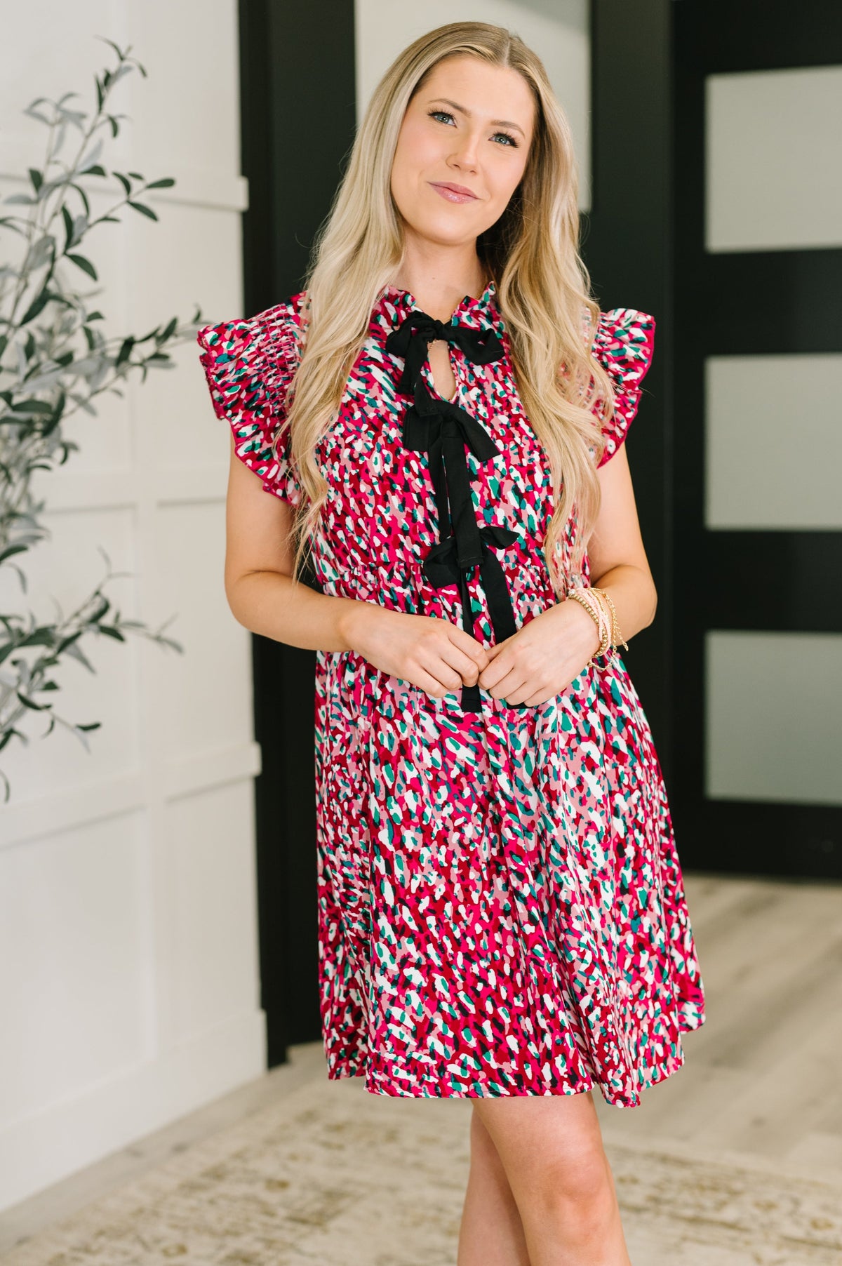 fuchsia pink dress, abstract print dress, bow detail dress, flutter sleeve dress, women's A-line dress, summer occasion dress, boutique dress with pockets, playful fuchsia fashion