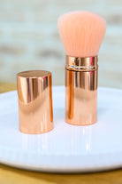 retractable makeup brush, rose gold powder brush, telescopic blush brush, travel beauty tools, synthetic makeup brushes, portable bronzer brush, professional makeup applicator