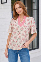 floral blouse, rose print top, flutter sleeve shirt, pink V-neck blouse, women's spring fashion, feminine garden top, casual dressy blouse, cream floral top