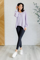 Lavender v-neck top, waffle knit tunic, asymmetrical hem top, women's cozy lounge top, drop shoulder sweater, lavender knitwear, chic casual top.