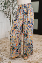 Wide leg pants, floral palazzo pants, smocked waist trousers, boho summer pants, women’s lightweight bottoms, 100% viscose pants, ruffle detail pants, bohemian chic style.