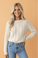 cable knit sweater, women's crew neck sweater, drop shoulder sweater, cotton blend knitwear, classic boutique sweater, long sleeve autumn top, breathable winter layers.