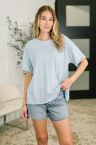 blue heathered tee, relaxed fit t-shirt, 100% cotton women's top, drop shoulder tee, raw hem shirt, lightweight blue t-shirt, casual layering top, airy summer tee
