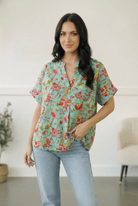 teal floral blouse, split neck top, womens flowy blouse, spring floral top, boutique summer clothing, lightweight polyester blouse, teal boho top, short sleeve floral shirt, easy wear summer tops

