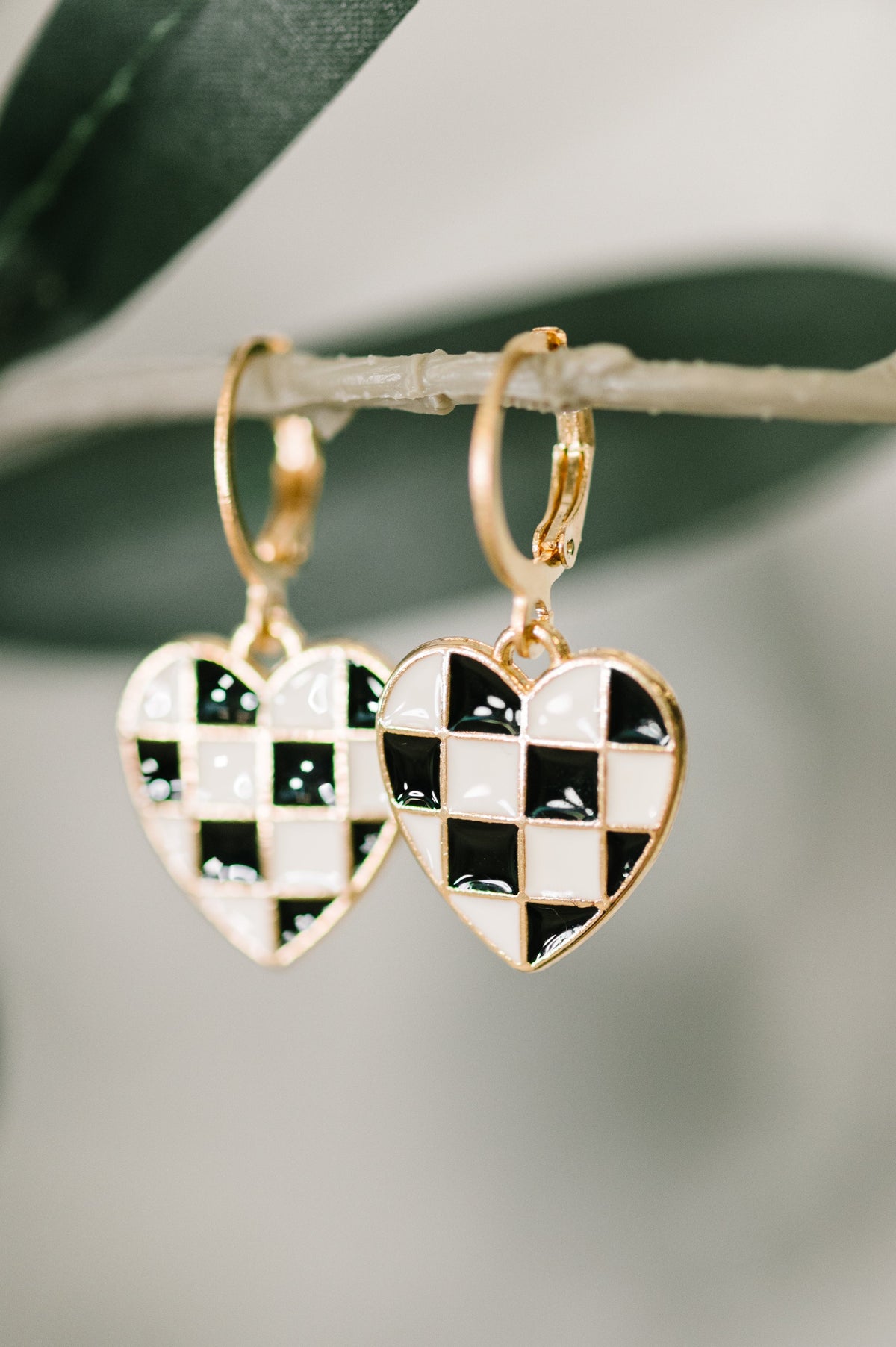 checkered heart earrings, heart huggie earrings, gold dangle earrings, enamel jewelry, retro heart earrings, black and white earrings, lightweight huggies, trendy heart jewelry