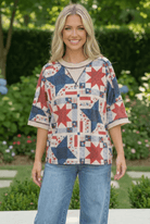 Patriotic women's top, quilt print shirt, Americana clothing, 4th of July outfit, star print blouse, relaxed fit summer top, patchwork fashion, red white and blue shirt.