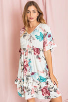 Plus size floral dress, V-neck ruffle dress, feminine spring fashion, empire waist mini dress, USA made women's clothing, floral print sundress, size-inclusive boutique.