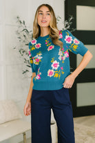 Floral knit top, puff sleeve sweater, short sleeve floral sweater, women's knit tee, teal floral top, elegant sweater knit, high stretch floral top, gathered shoulder top.