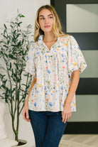 floral blouse, notch neck top, poplin floral shirt, ruffle neck blouse, balloon sleeve top, women’s spring fashion, boho floral top, summer poplin blouse, chic floral clothing