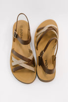Tan sandals, strappy sandals, slingback sandals, woven leather sandals, women's summer footwear, comfortable tan sandals, round toe sandals, adjustable ankle strap shoes.