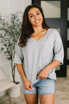 Oversized Tunic Top, Grey V-Neck Tunic, Women's Jersey Knit Top, High Stretch Tunic, Raglan Sleeve Top, Modern Athleisure, Comfortable Layering Piece, Grey Tunic with Side Slits.