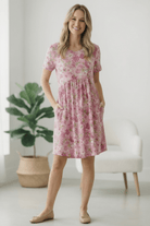fuchsia floral dress, pink babydoll dress, floral knit dress with pockets, casual fit and flare dress, women’s spring fashion, stretchy knit floral dress, comfortable everyday dress