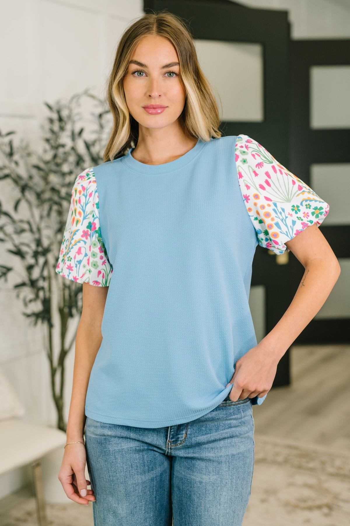 puff sleeve blouse, floral contrast top, textured knit shirt, women’s dressy tops, office casual blouse, stretch knit blouse, feminine floral top, boutique fashion