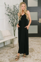 Black maxi dress, jersey knit dress, spaghetti strap maxi, dress with pockets, soft maxi dress, casual black dress, versatile summer dress, stretchy maxi dress.